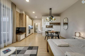 Geneva: A charming patio studio with private parking!